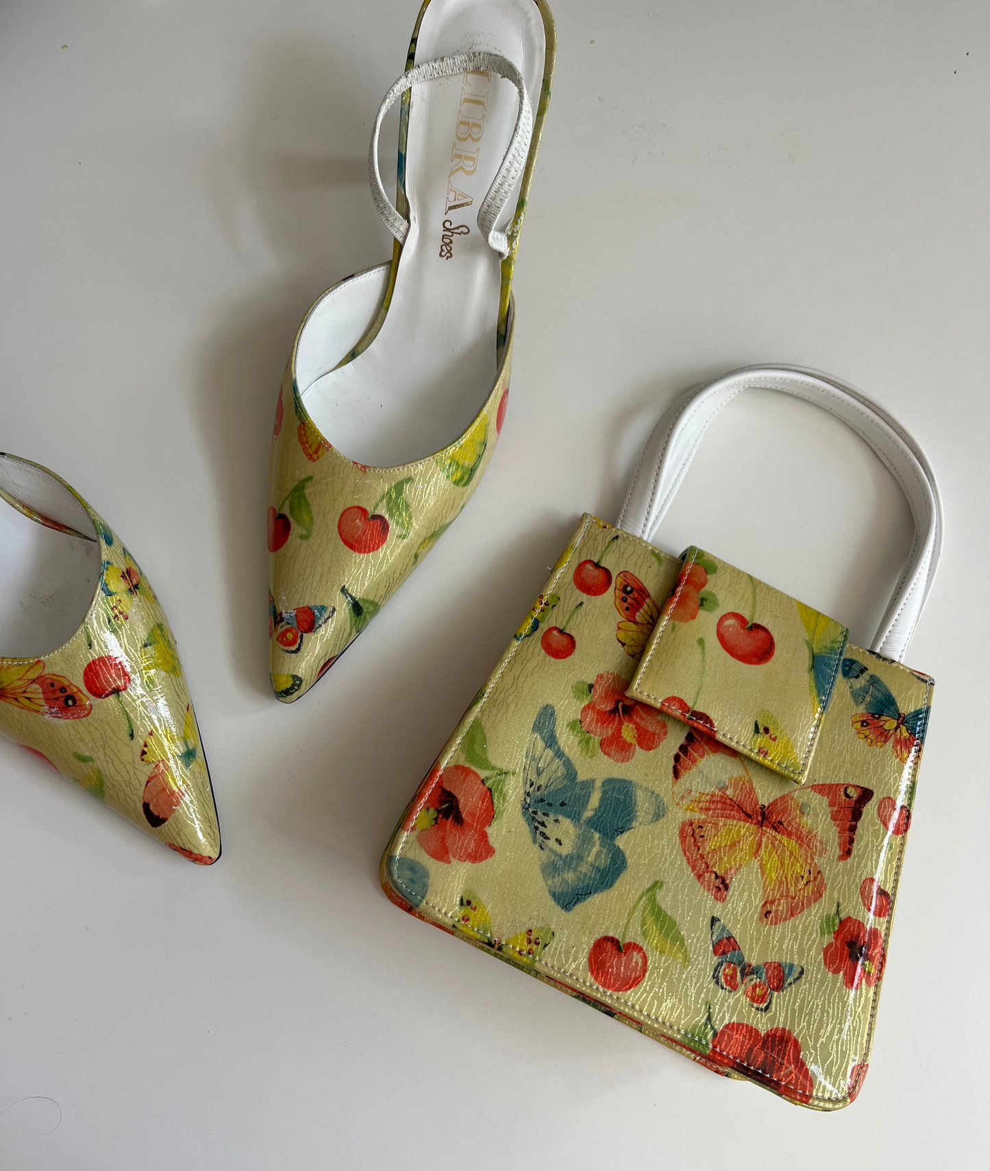 Italian designer matching mules and handbag
